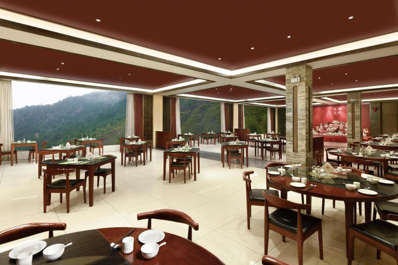 Hotel Ramada Encore Daocheng Yading Esterno foto