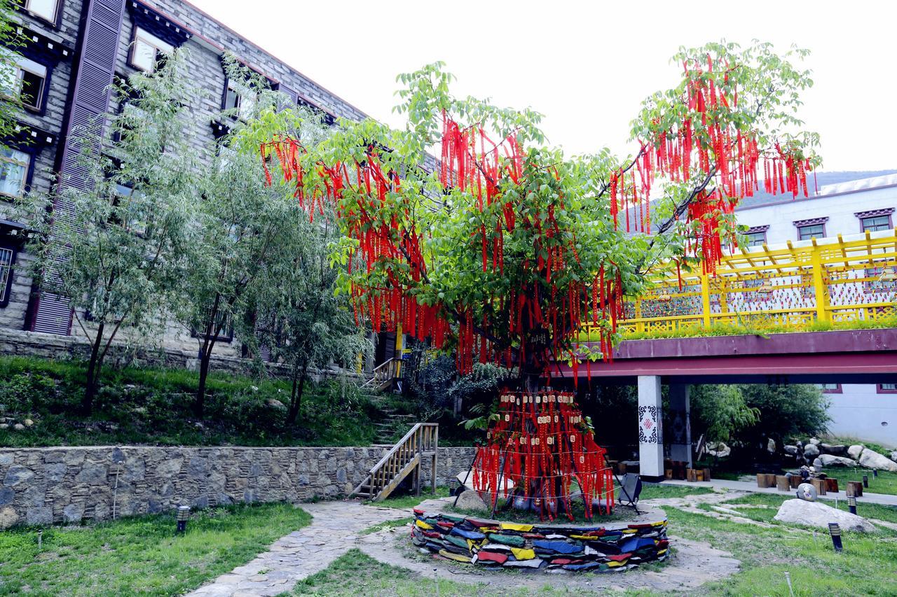 Hotel Ramada Encore Daocheng Yading Esterno foto